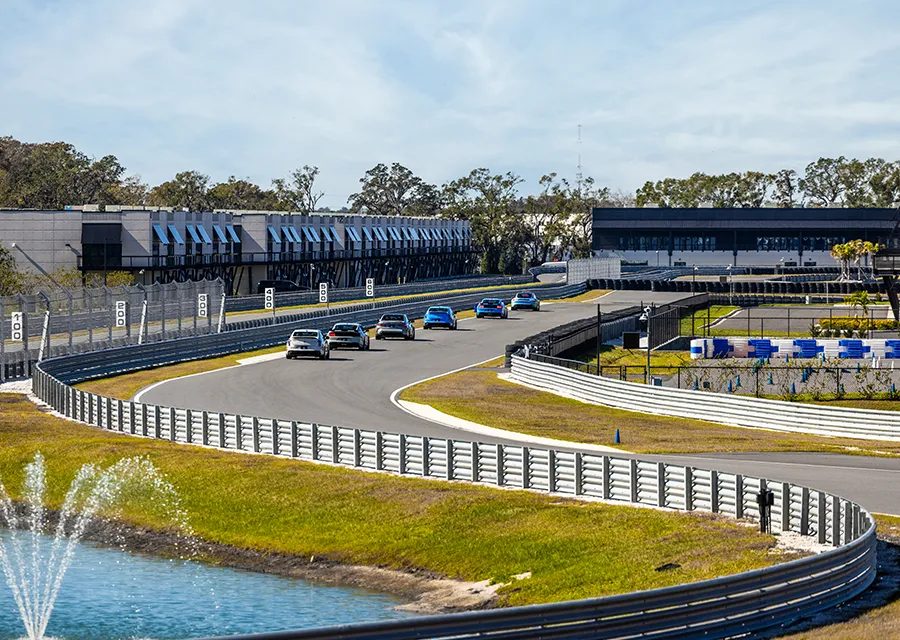 Supercars on the track at The Motor Enclave Tampa
